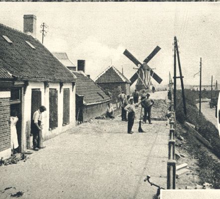 Klik voor de volgende foto